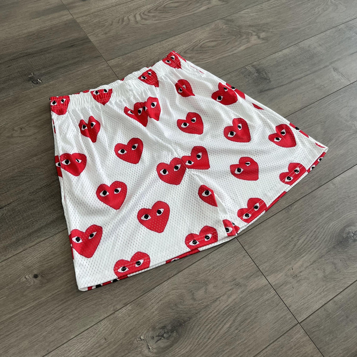 RED CDG MESH SHORTS-8716