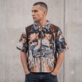 CHAMPIONS 2025 TAPESTRY TEE